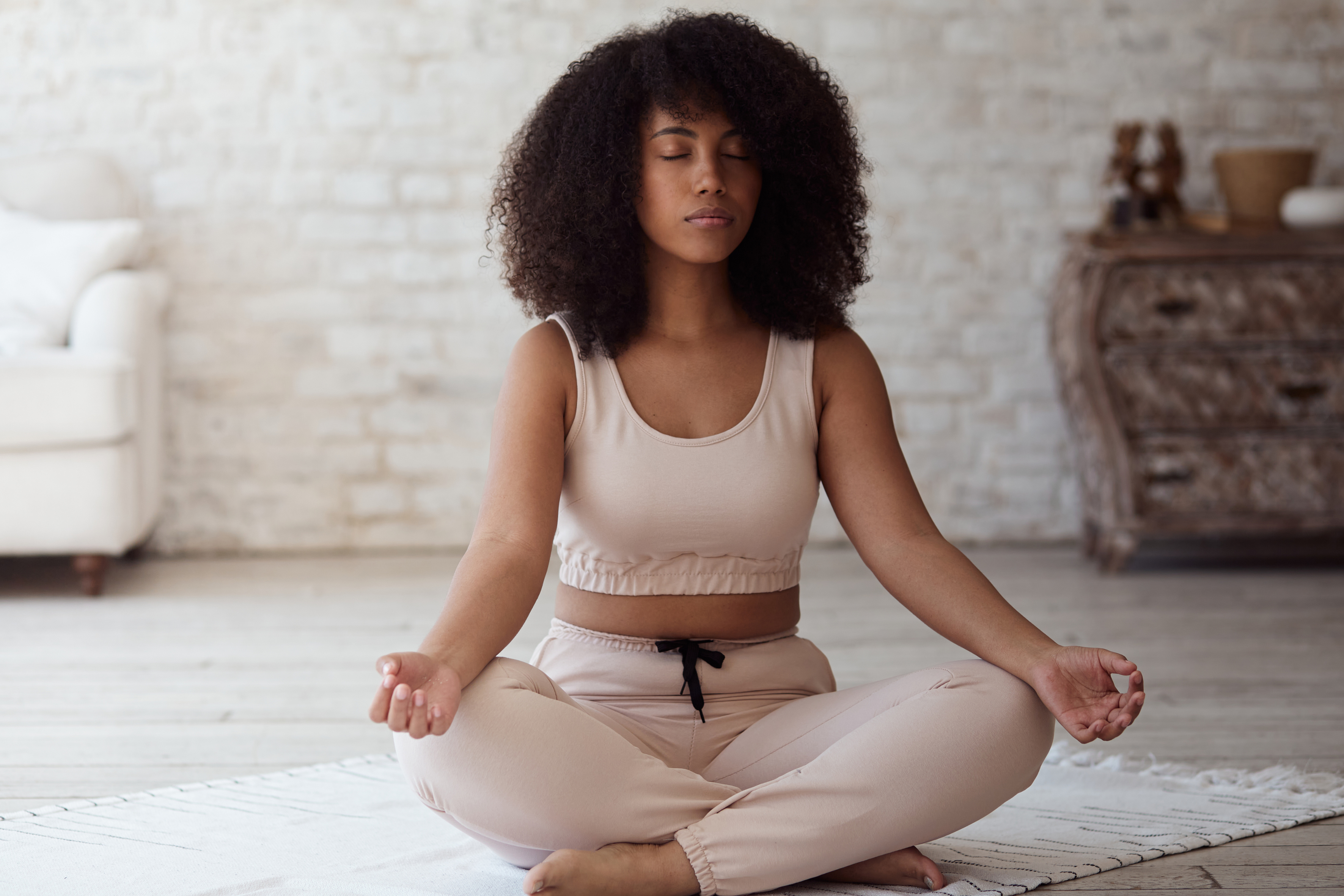 Image of woman doing breathing techniques